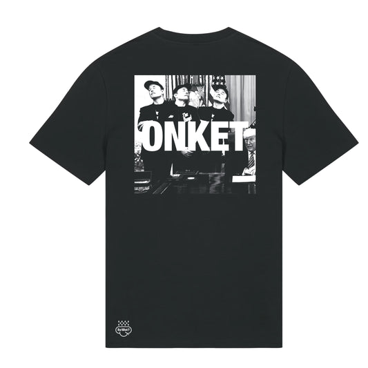 Black t-shirt with a graphic design on the back featuring text and funny images of Elon Musk and Donald Trump on a white background.